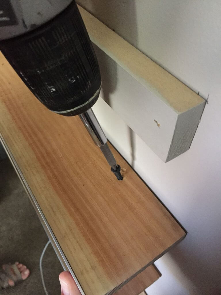 Screw shelf into wood cleat for DIY display shelves
