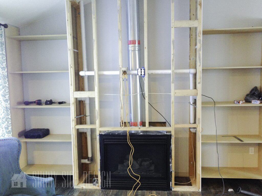 framing of fireplace and shelves