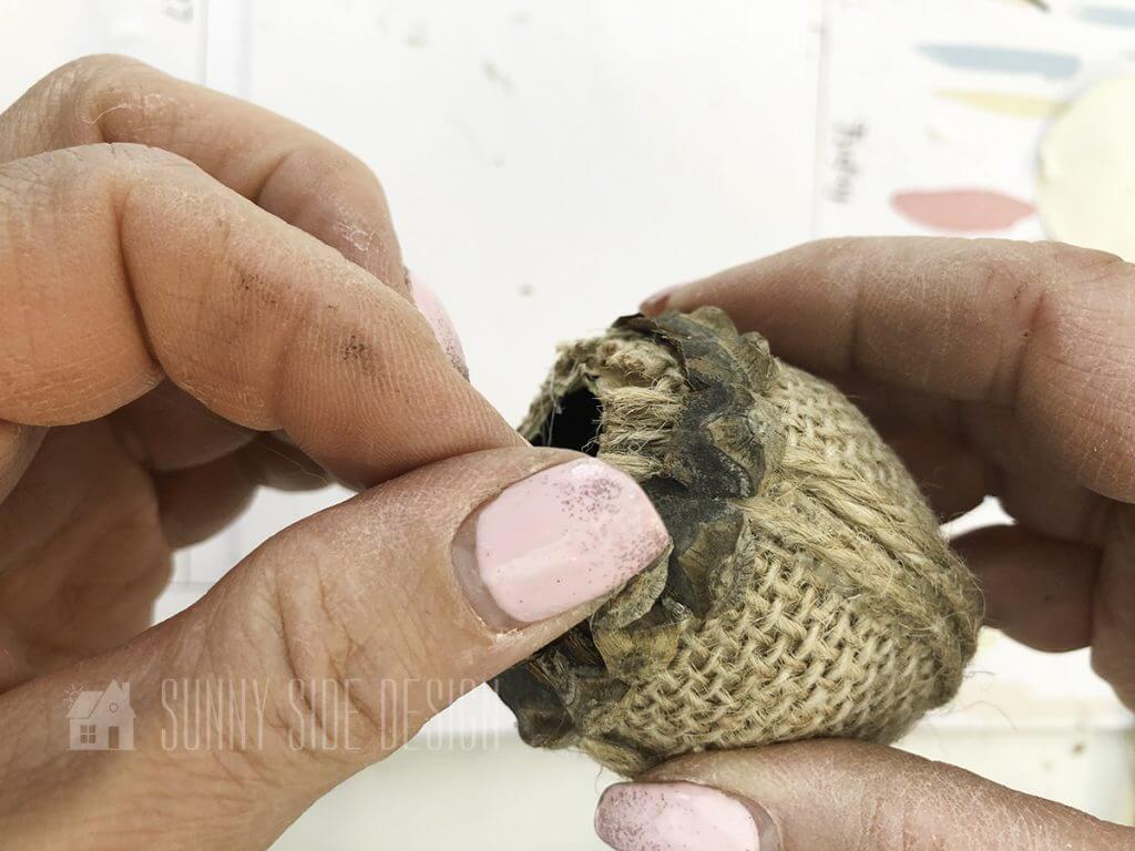 gluing acorn scales to the acorn