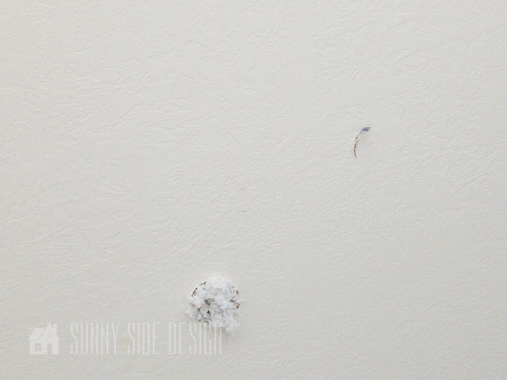 cutting a hole in the ceiling to center the light in the room