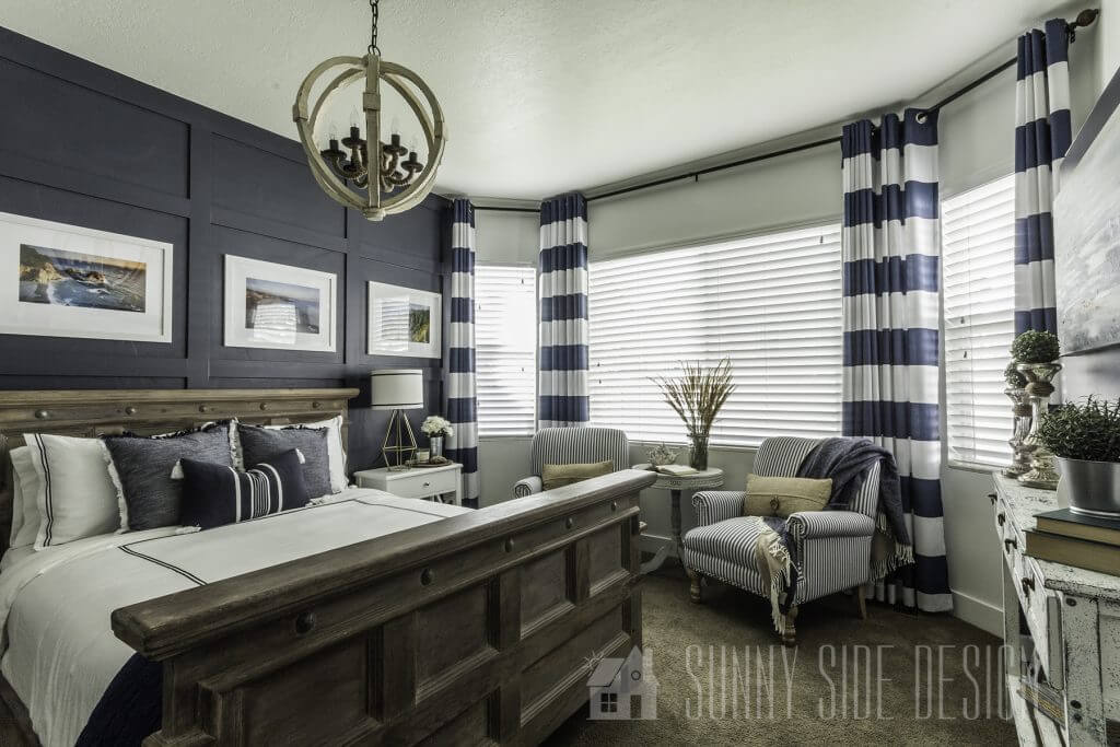 angled view of coastal master bedroom makeover on a budget