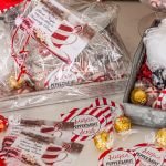 Homemade pepperment sugar scrub, pampering gift with a candle and chocolates.