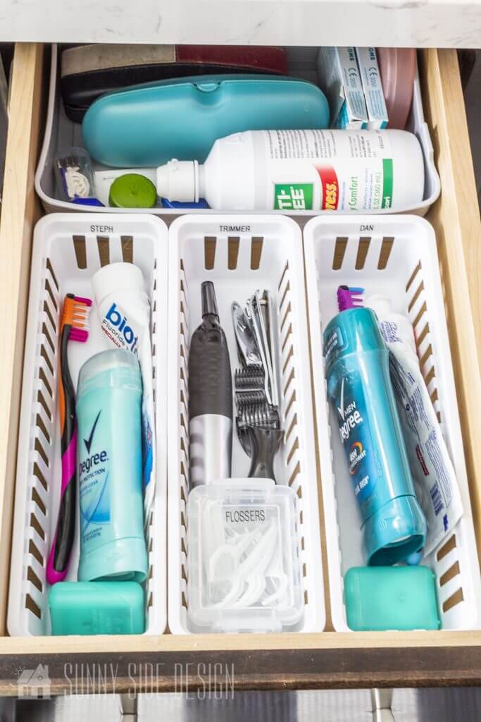 Narrow plastic bins are used to sort dental products, trimmer, and contact lens products.
