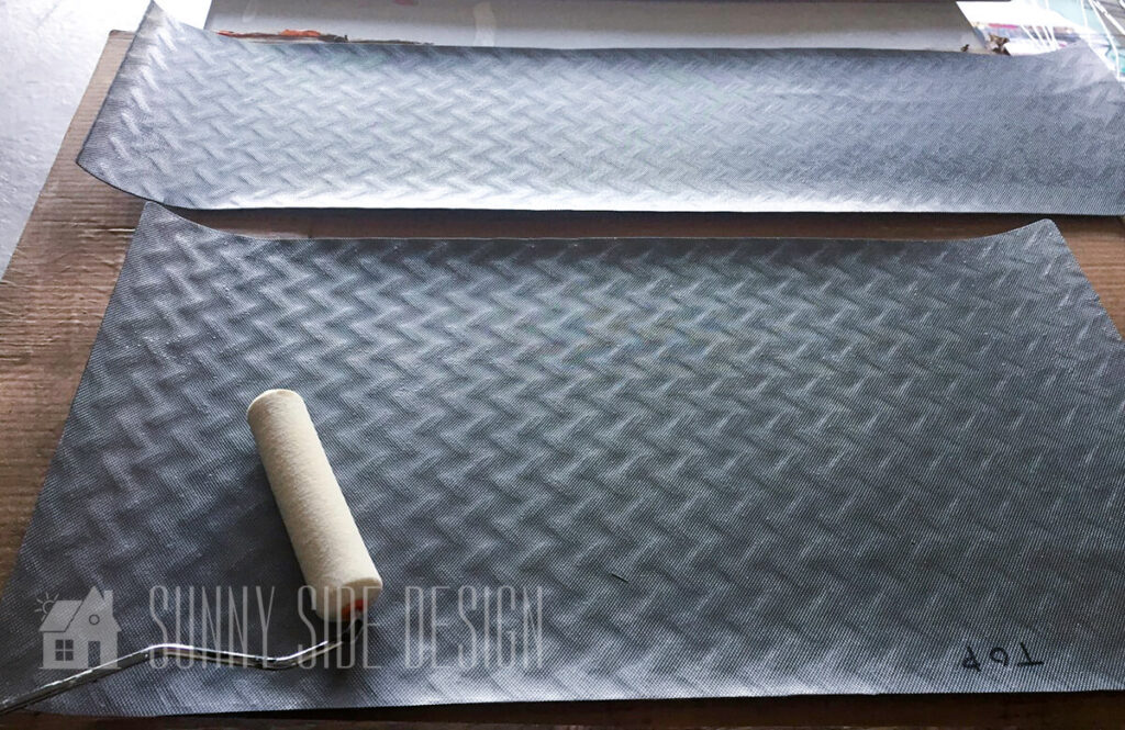 applying contact cement to back side of carpet runner