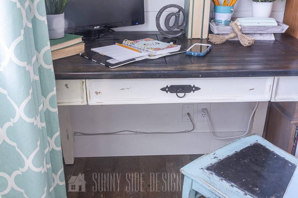 Hide desk cords by running them along baseboards and securing them with cable clips.