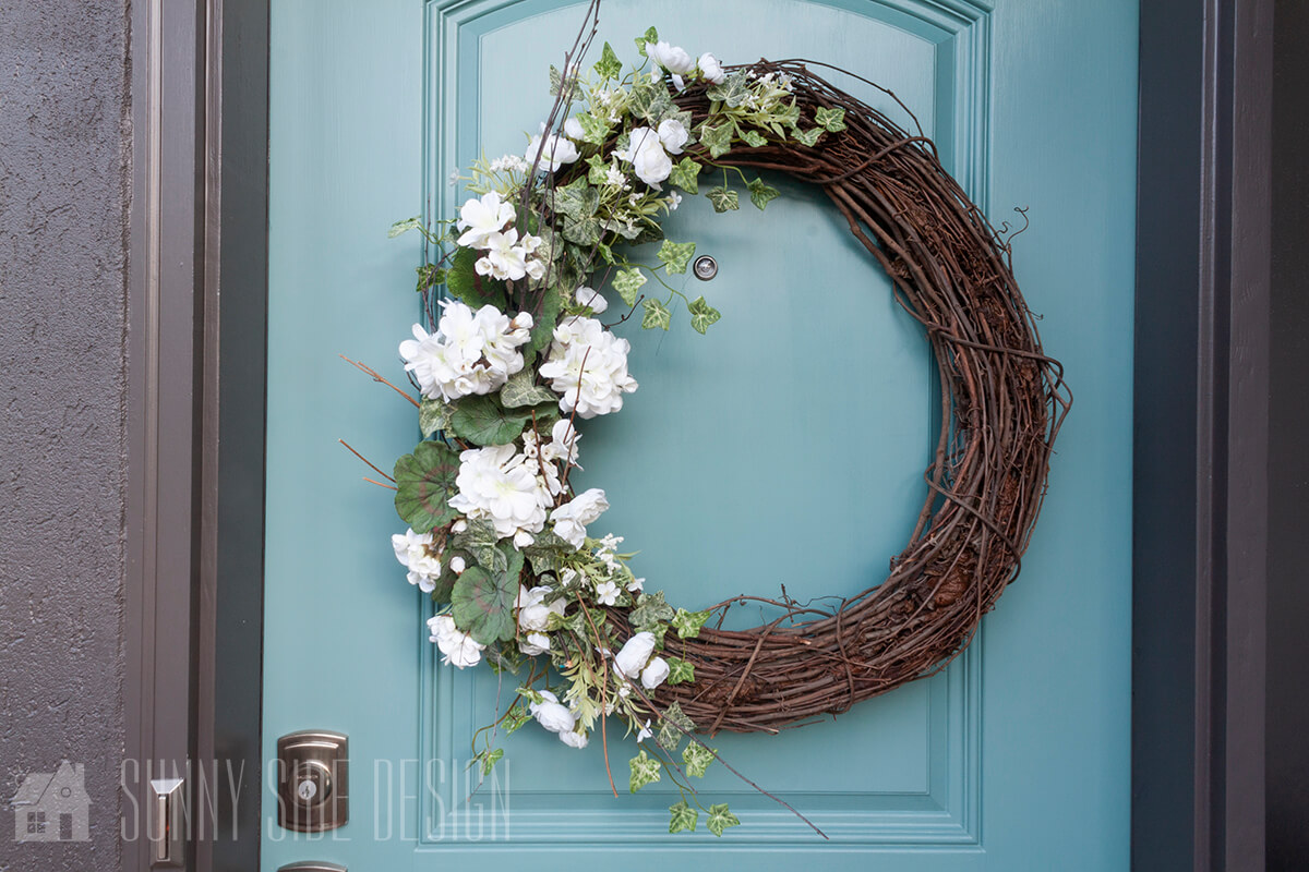 Front Porch Decor Ideas Inviting wreath to greet guests.