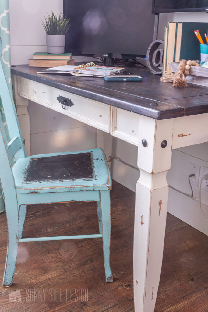 Hide desk cords by running them along baseboards and securing them with cable clips.
