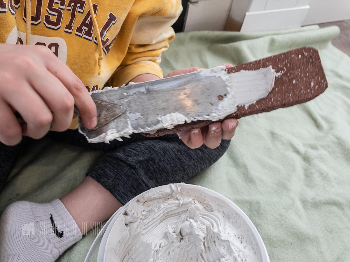 buttering the brick veneer