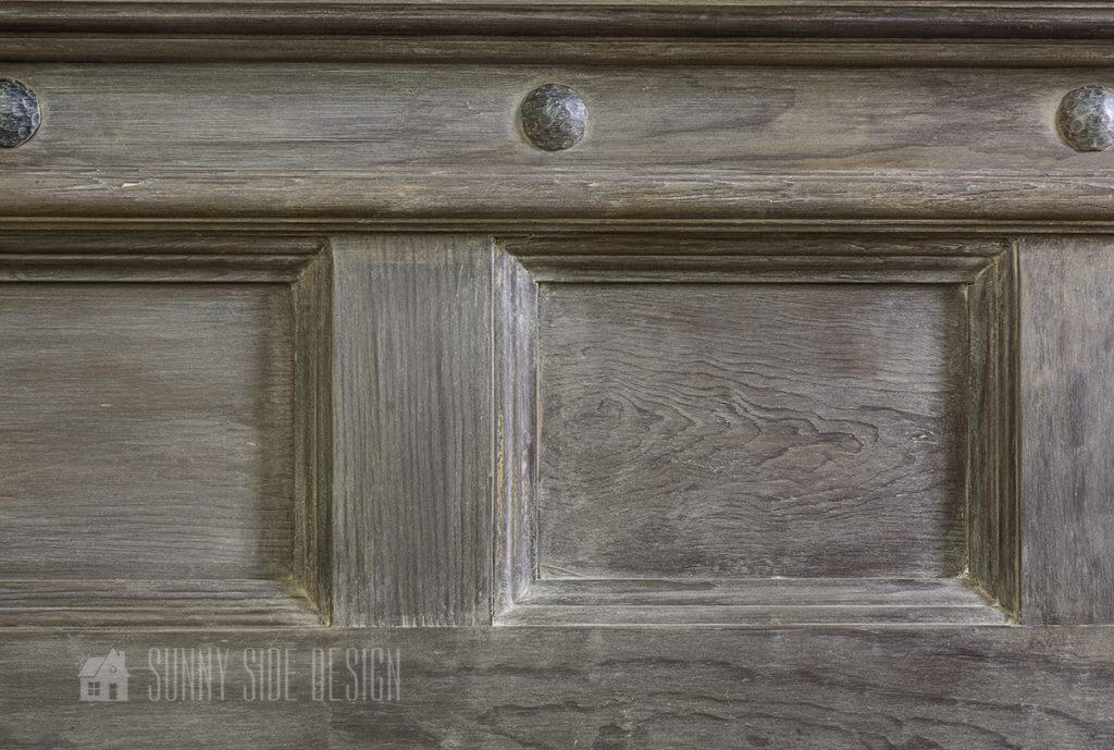 How to weather wood with vinegar and steel wool, footboard showing the details of the finished with rustic nail head accents.