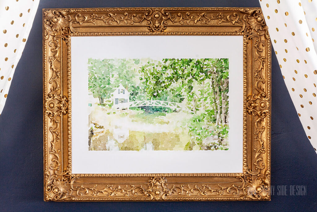 Gold framed wall art above day bed in tween girl bedroom.