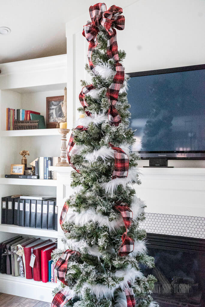 CHRISTMAS TREE DECORATING, added plaid ribbon on the tree.