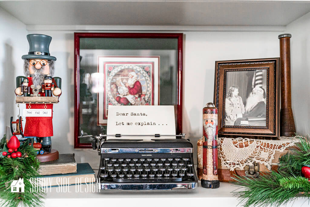 Vintage Christmas Decor Ideas, vintage typewriter with a note from Santa, nutcrackers, vintage photos with Santa and greenery picks.