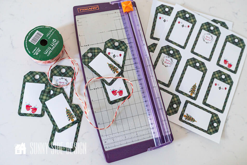 Printable Gift Tags with a paper trimmer and Christmas cord.