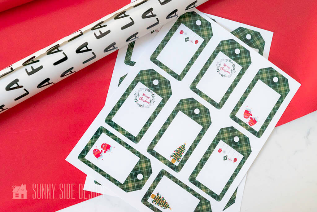 Printable Gift Tags with red and fa la la la wrapping paper.