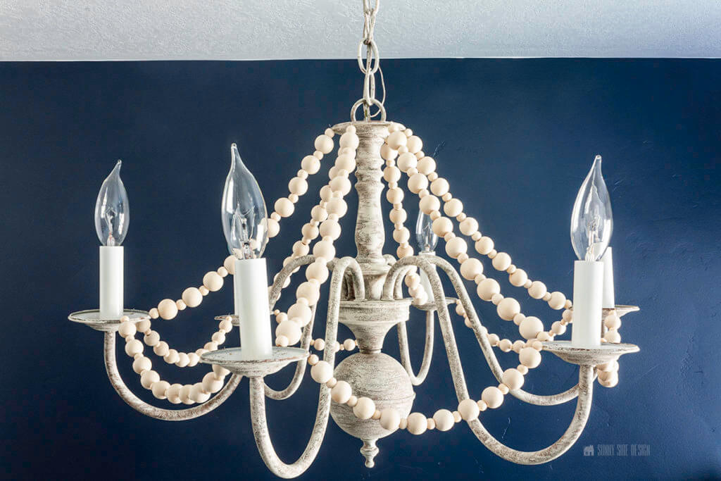 brass to faux wood finish chandelier