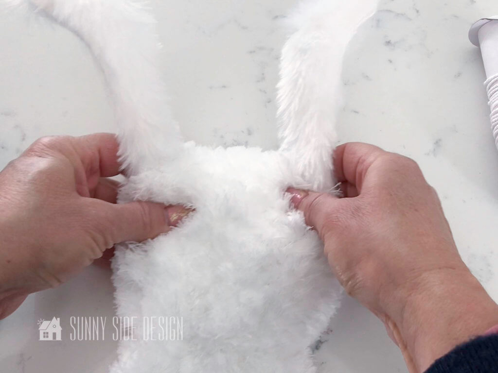 Attach bunny ears to body with hot glue.