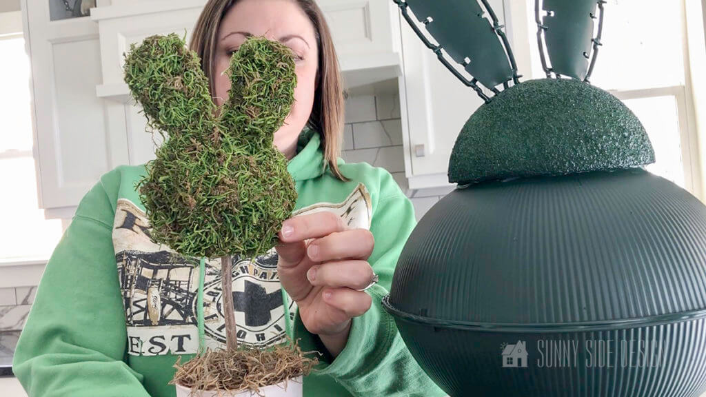 Outdoor Easter Decoration prepped with paint, with small moss bunny topiary.
