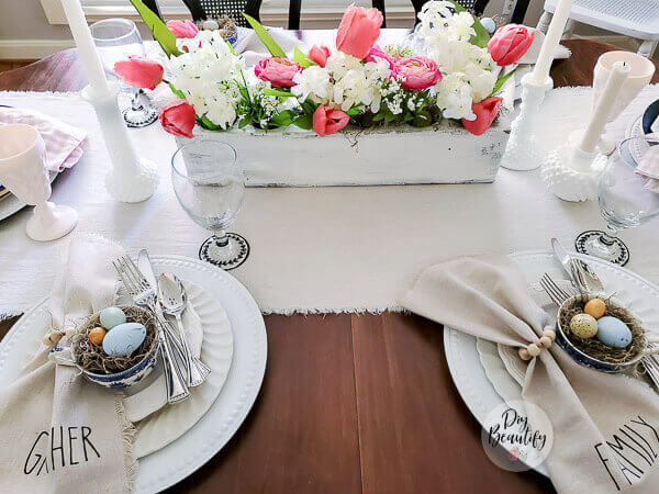 Easter Table Decor with egg and nest at each place setting.