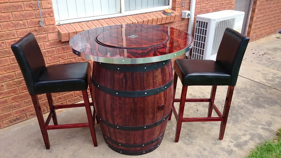 Create a pub style outdoor table from an old wine barrel.