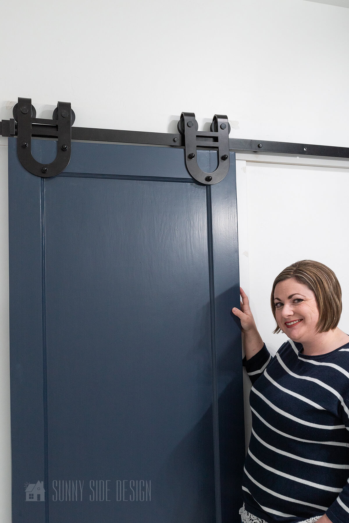 How To Make an Affordable Barn Door for the Bathroom