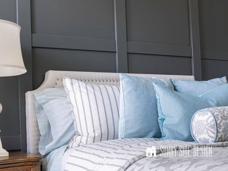 Beautiful Board and Batten Wall with a Hidden Door Sunny Side Design