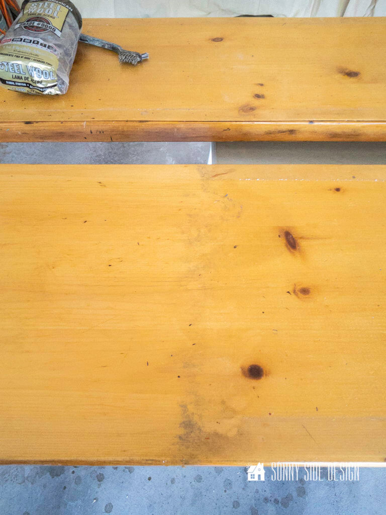 Two wood bench tops that are partially stripped of the finish that we will use for the top of our DIY sofa table.