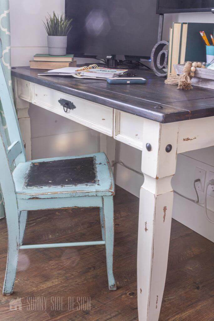 Flea market flip ideas, thrift store desk is updated with a wood finish top and the base and legs with white chalk paint. Vintage aqua glue chair with a black leather seat.