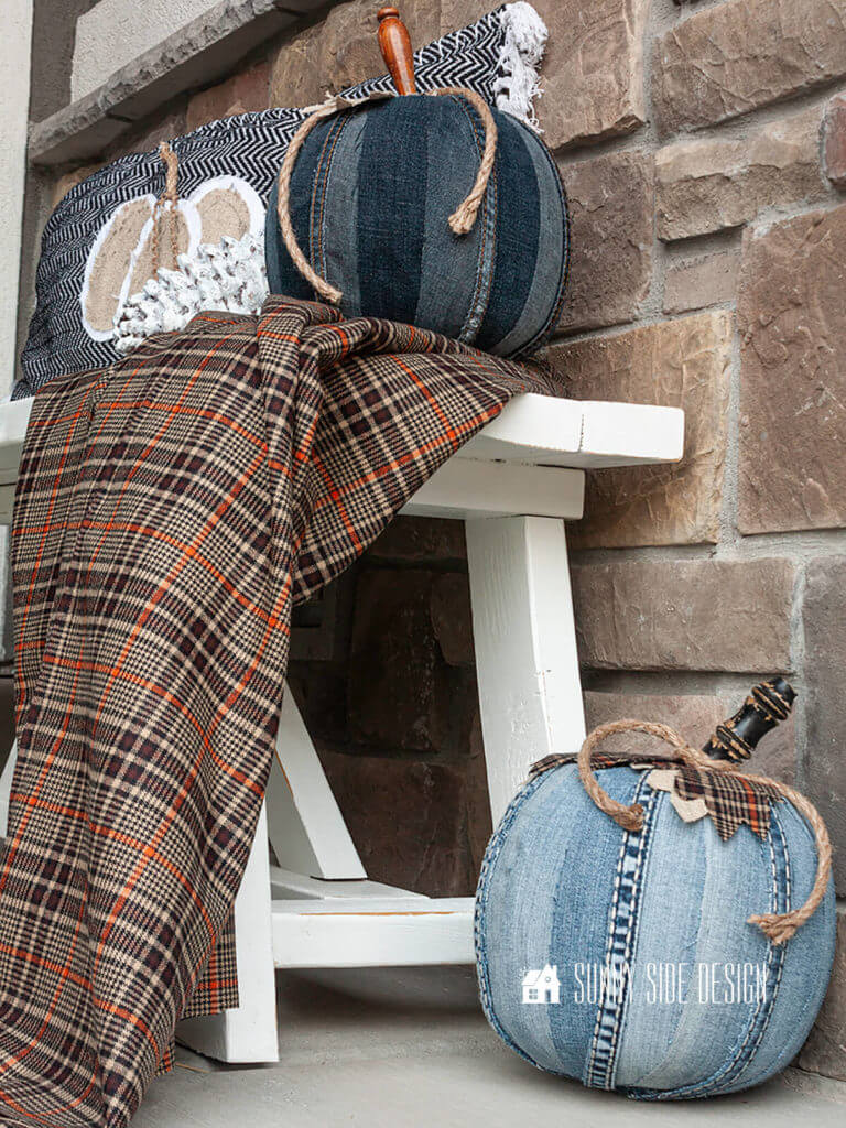 Flea market flip ideas, thrift store pumpkin treat buckets are upcycled with old denim jeans into fall pumpkin decor
