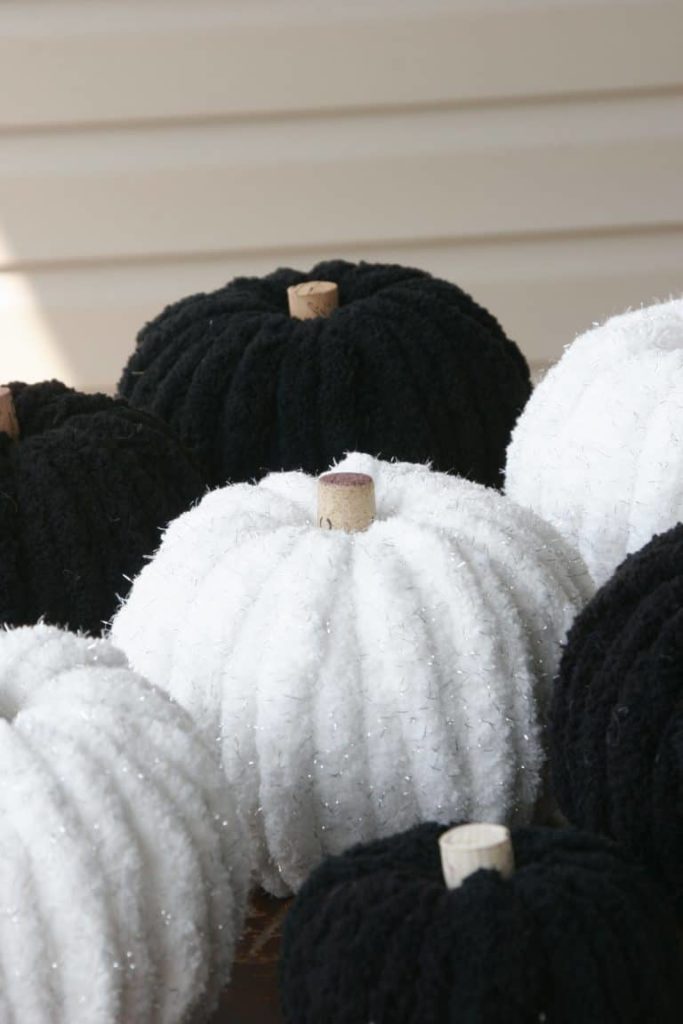 Easy Halloween decor ideas for your home. Black and white DIY yarn pumpkins.