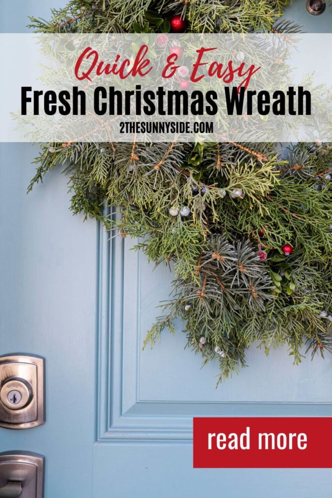 Pinterest image, Fresh Christmas Wreath on a light blue door.