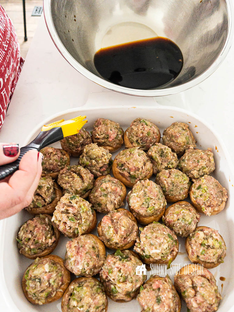 Easy stuffed mushroom recipe, soy sauce is brushed on the meat filled mushroom caps.
