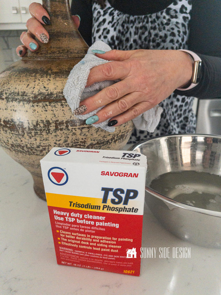 Clean the lamp base with a degreaser like TSP.