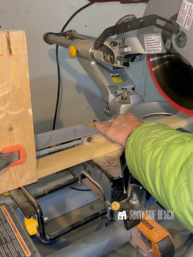 A block is used as a stop for cutting cleats with the miter saw.