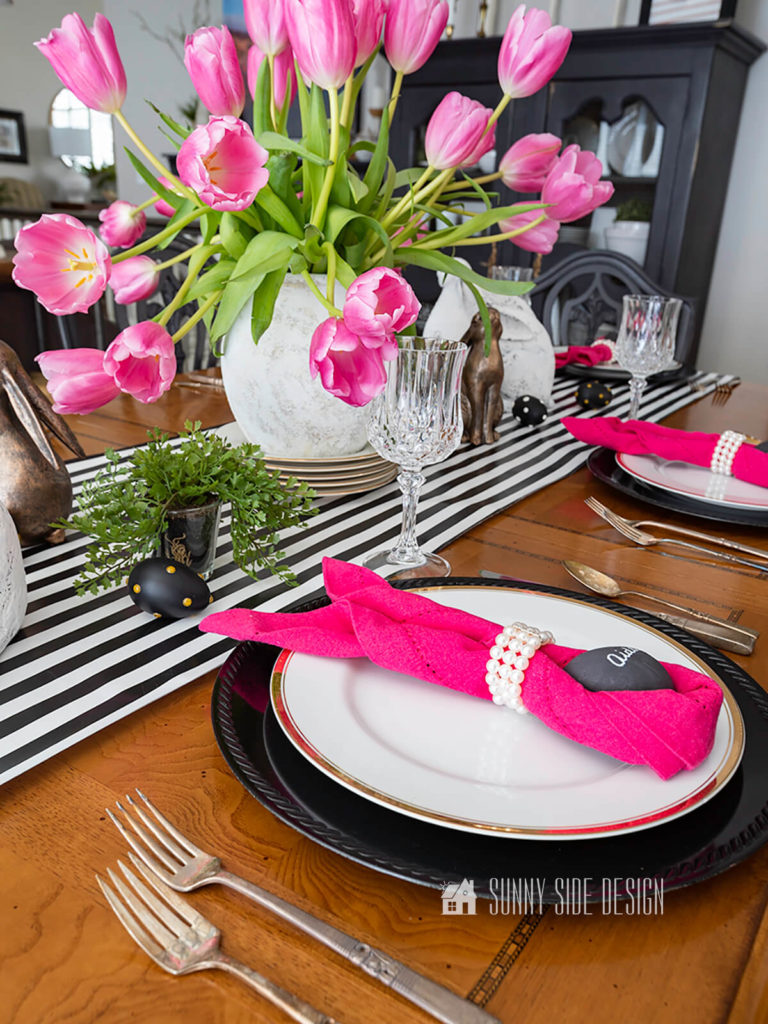 Set an Easter table that's Kate Spade inspired, with black, white, hot pink, gold, pearls and rhinestones. Playful elegance!