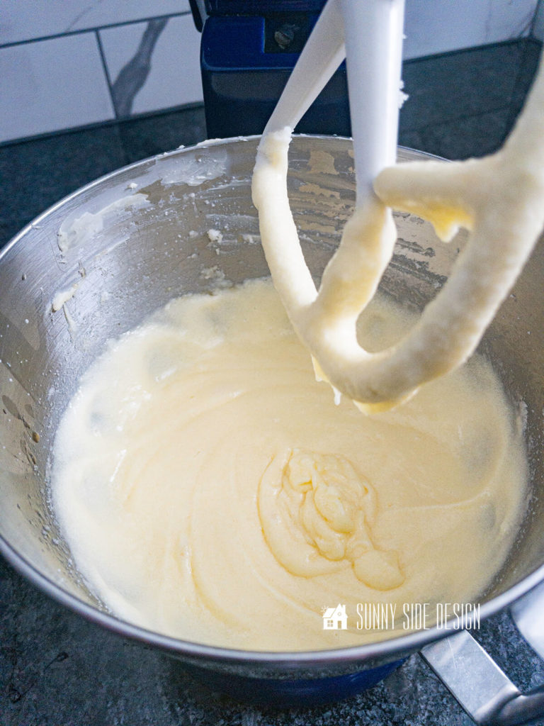 Beat eggs into the creamed butter and sugar mixture.