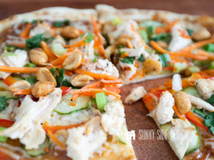 Cooked Thai Chicken Pizza with a Peanut sauce.