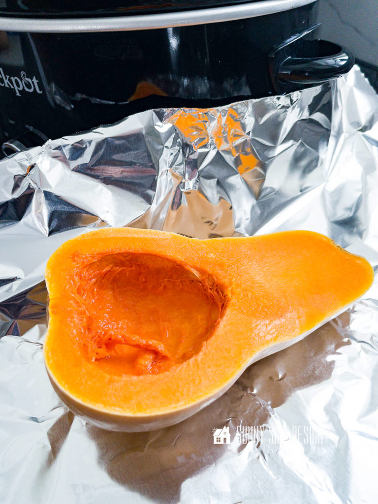 Place halved and seeded butternut squash on a sheet of foil, wrap and cooke until tender in a slow cooker.
