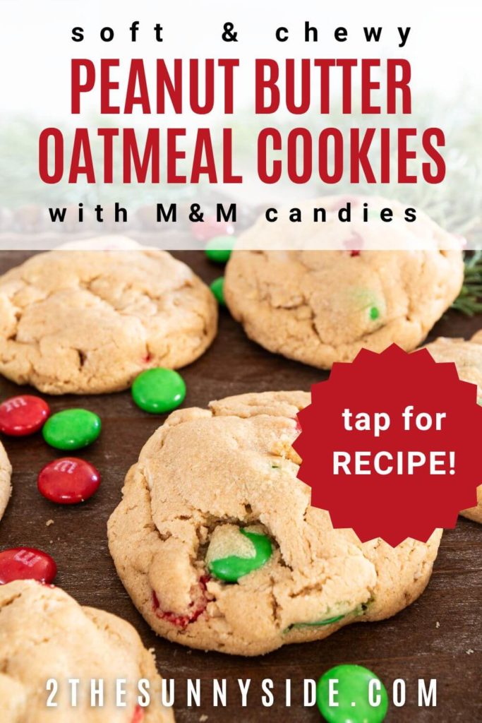 PINTEREST IMAGE, PEANUT BUTTER OATMEAL COOKIES WITH M&M CANDIES, SPRINKLES WITH ADDITIONAL M&MS ON A WOOD TRAY