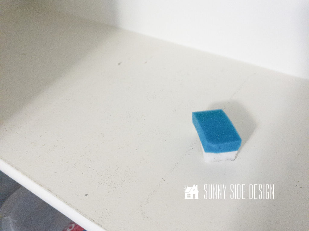 Clean shelf scuff marks on shelves with a magic eraser.