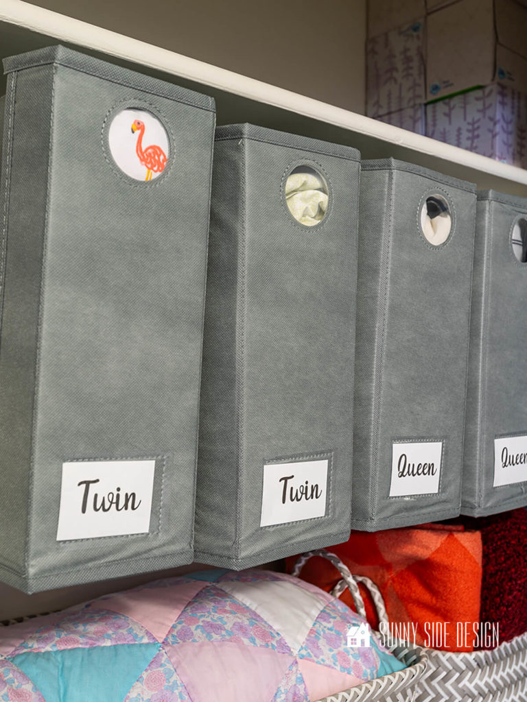 Keep sheets neat and tidy in labeled containers, organize linen closet.