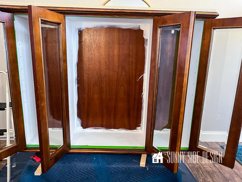 white-chalk-paint-applied-to-inside-hutch-top