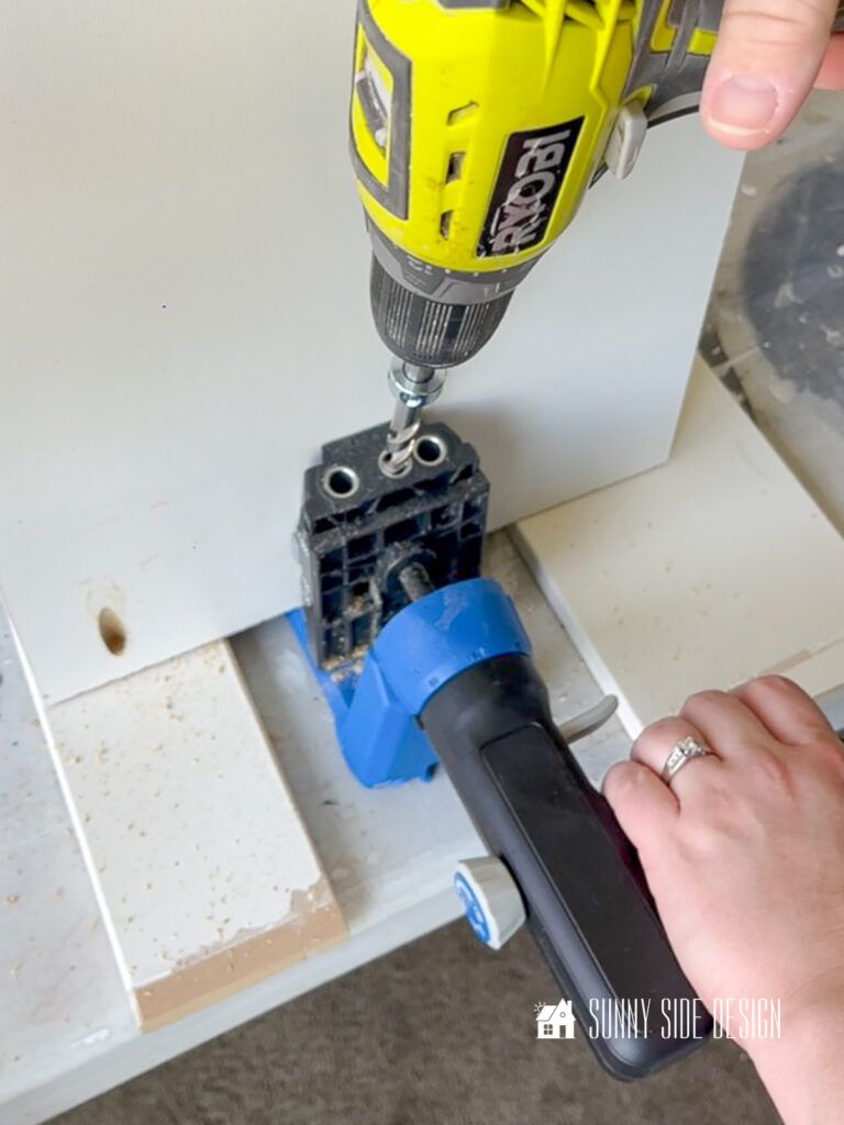 Using a Kreg pocket hole jig, 3 pocket holes are made in each side of the selves for the shoe organizer.