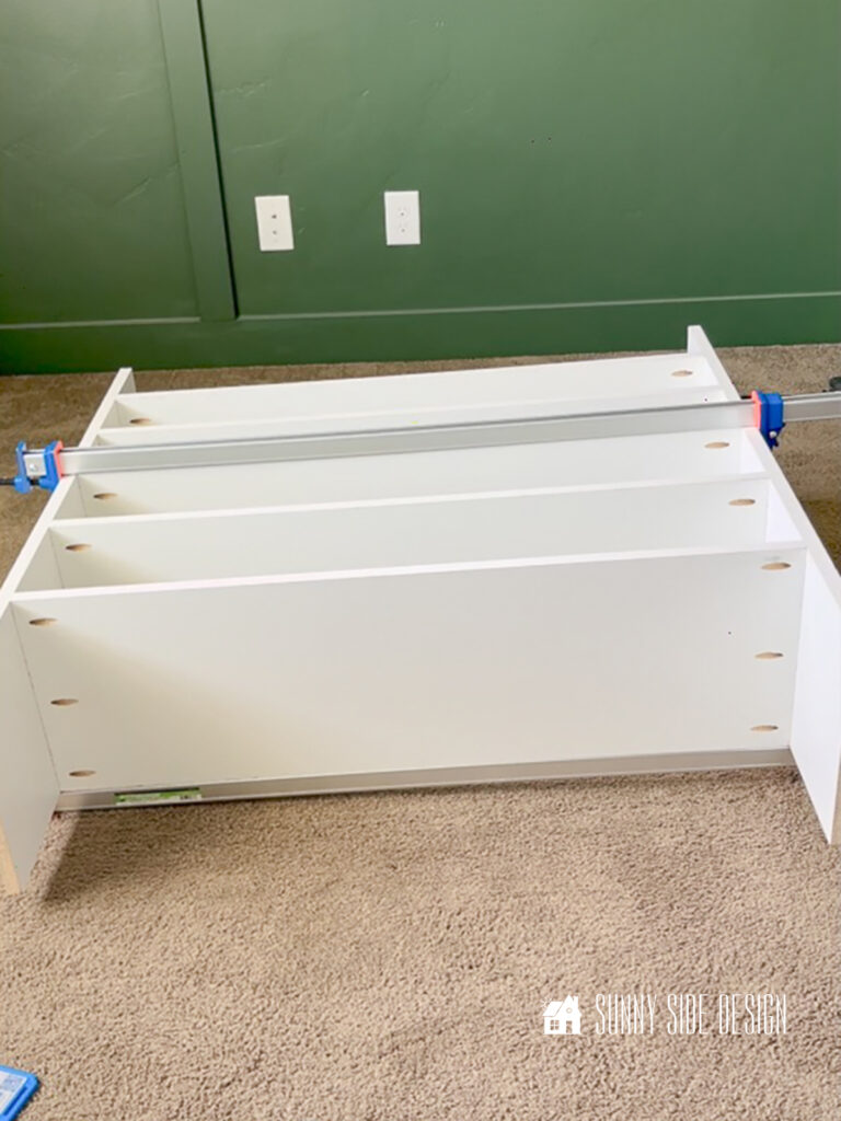 Assemble DIY closet organizer with pocket screws.