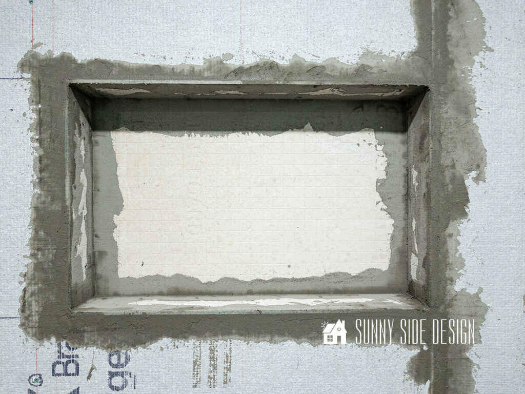 Mortar is applied over the all the seams for the niche.