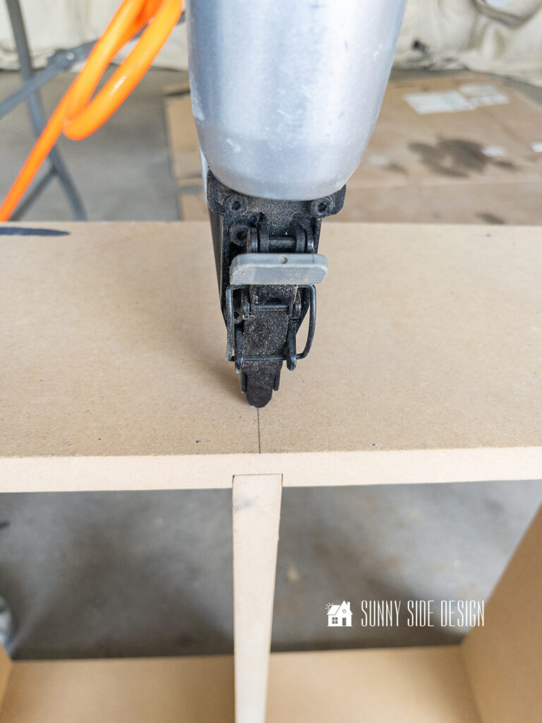 Recessed shelves are attached together with wood glue and a brad finish nailer.