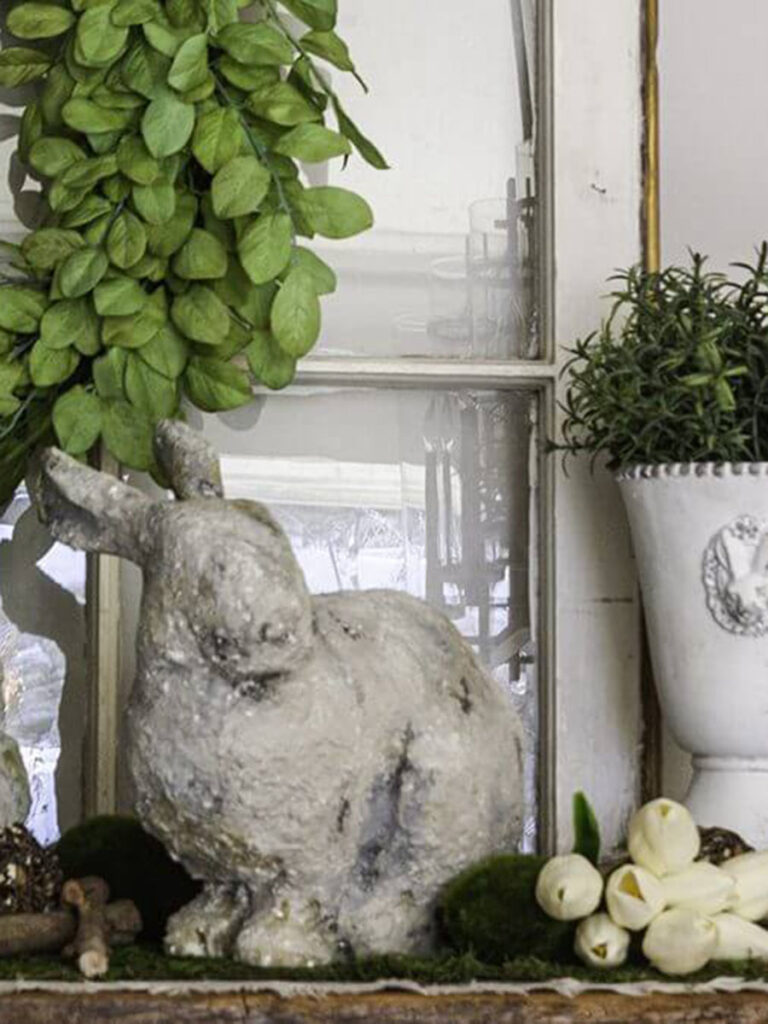 completed thrifted bunny with a stone look styled for spring