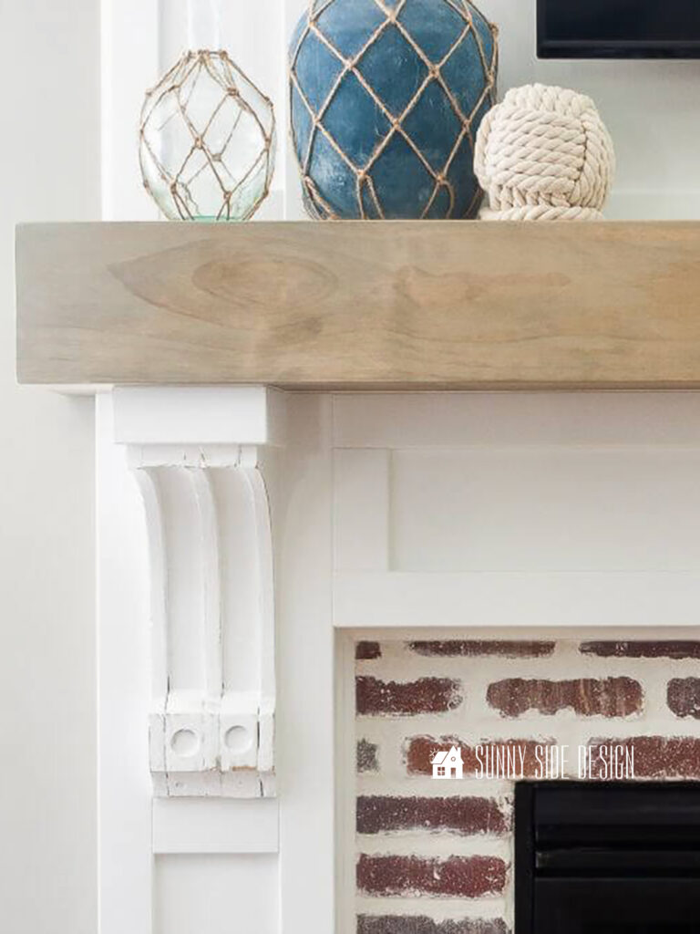 Upcycled Ideas: vintage corbels are restored and used on a new fireplace mantle and surround.