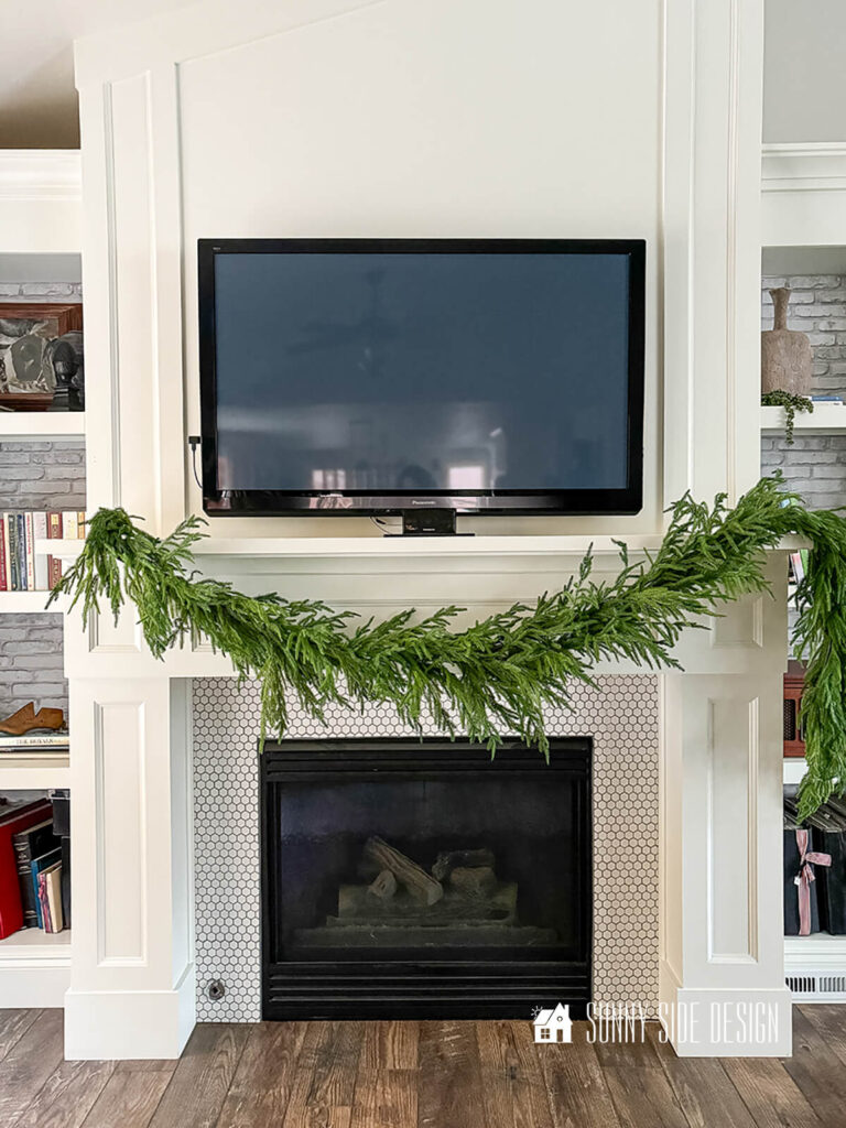 Two faux garlands hung together to add fullness on the mantle.