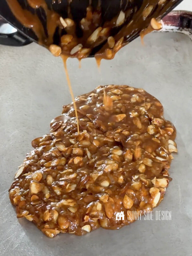 Hot Toffee layer is poured onto a greased sheet pan.