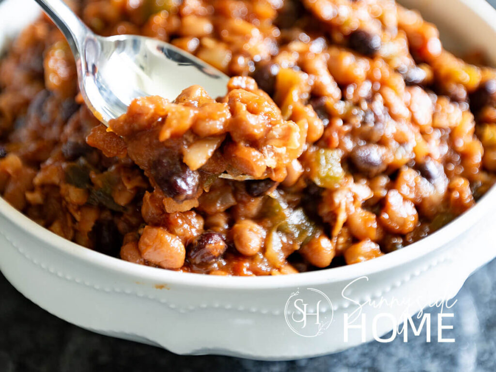 Spooning up a serving of homemade beans.